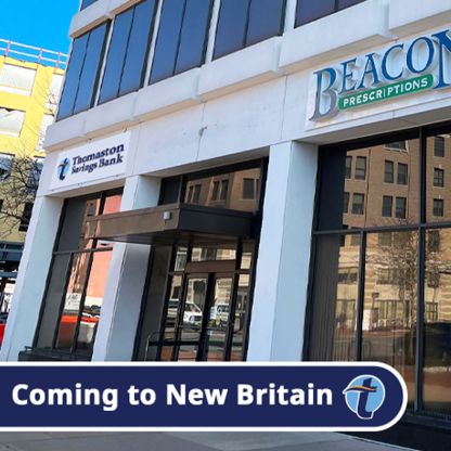 A commercial building with a mockup of the New Britain branch sign, with the text "Coming to New Britain" overlayed.